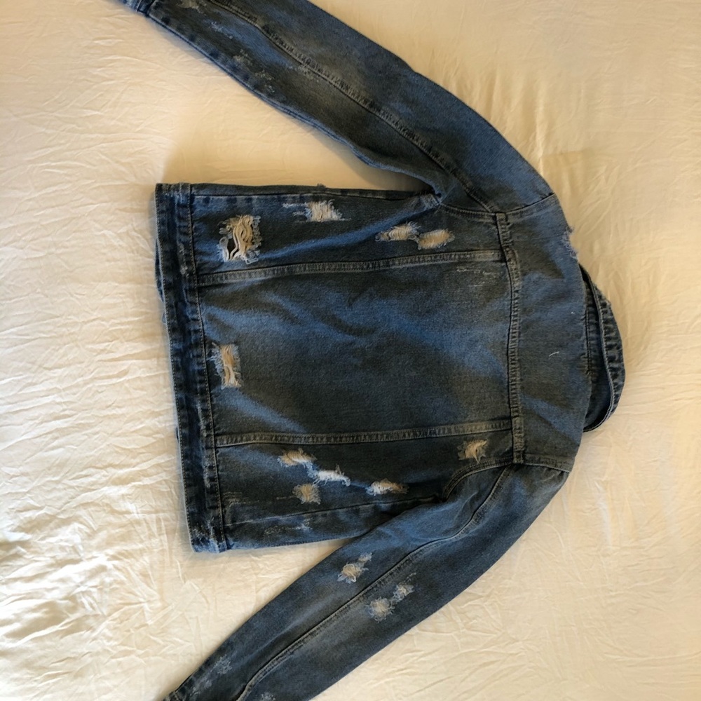 Distressed jean jacket